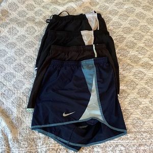 4 pairs of 2X Nike Dri-Fit Athletic Running Shorts in multiple colors